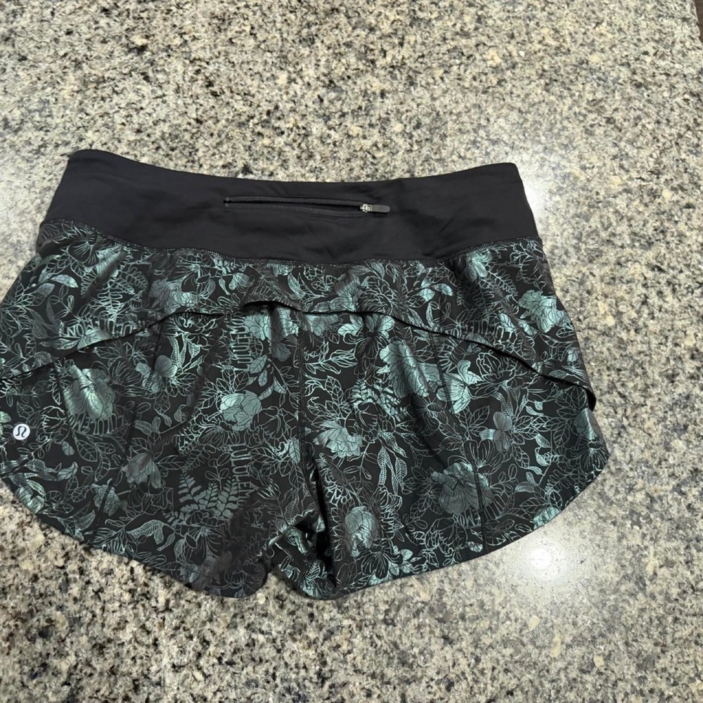 Lululemon Speed Up Mid-Rise Short 4" Black Teal Floral Size 10 W7BCRT